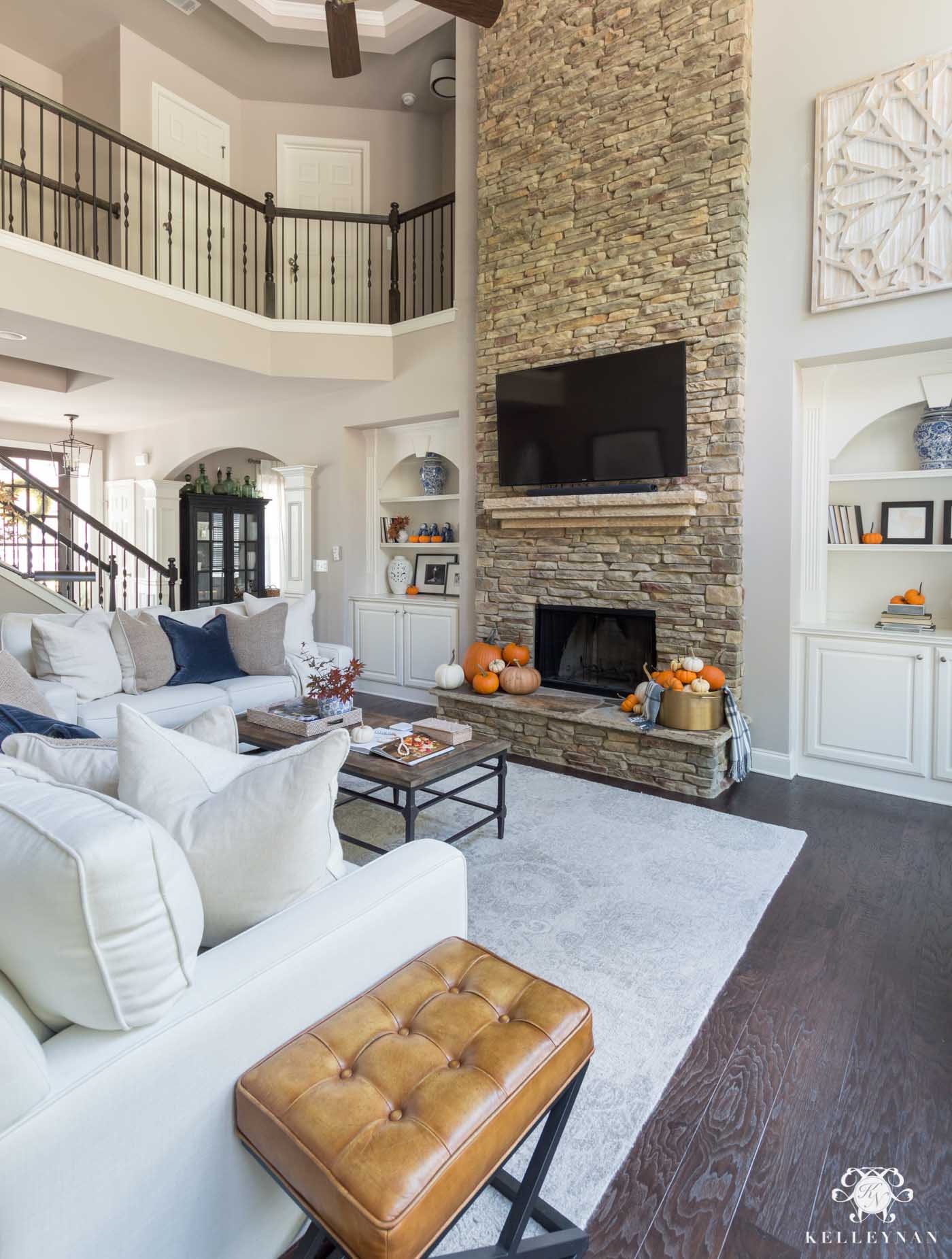 Fall living room decor and stone fireplace inspo