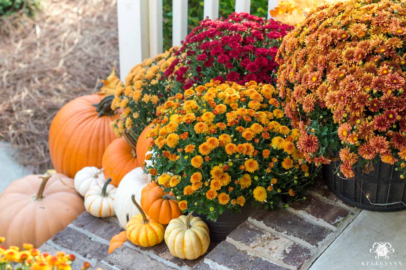 Fall front porch decor with traditional autumn colors