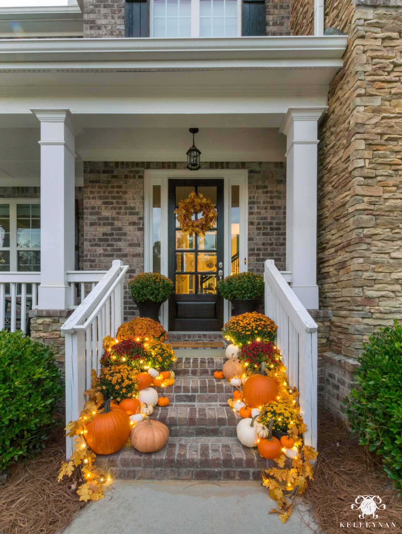 Fall front porch decorating with twinkle lights