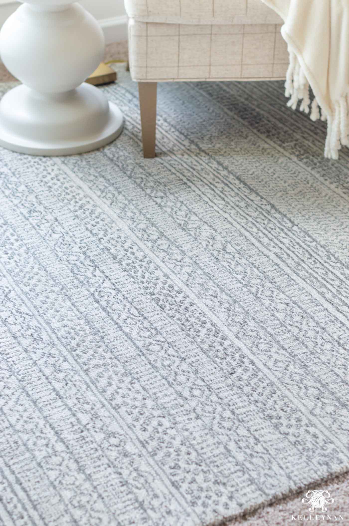 Why Rugs Should be Layered On Carpet - Kelley Nan