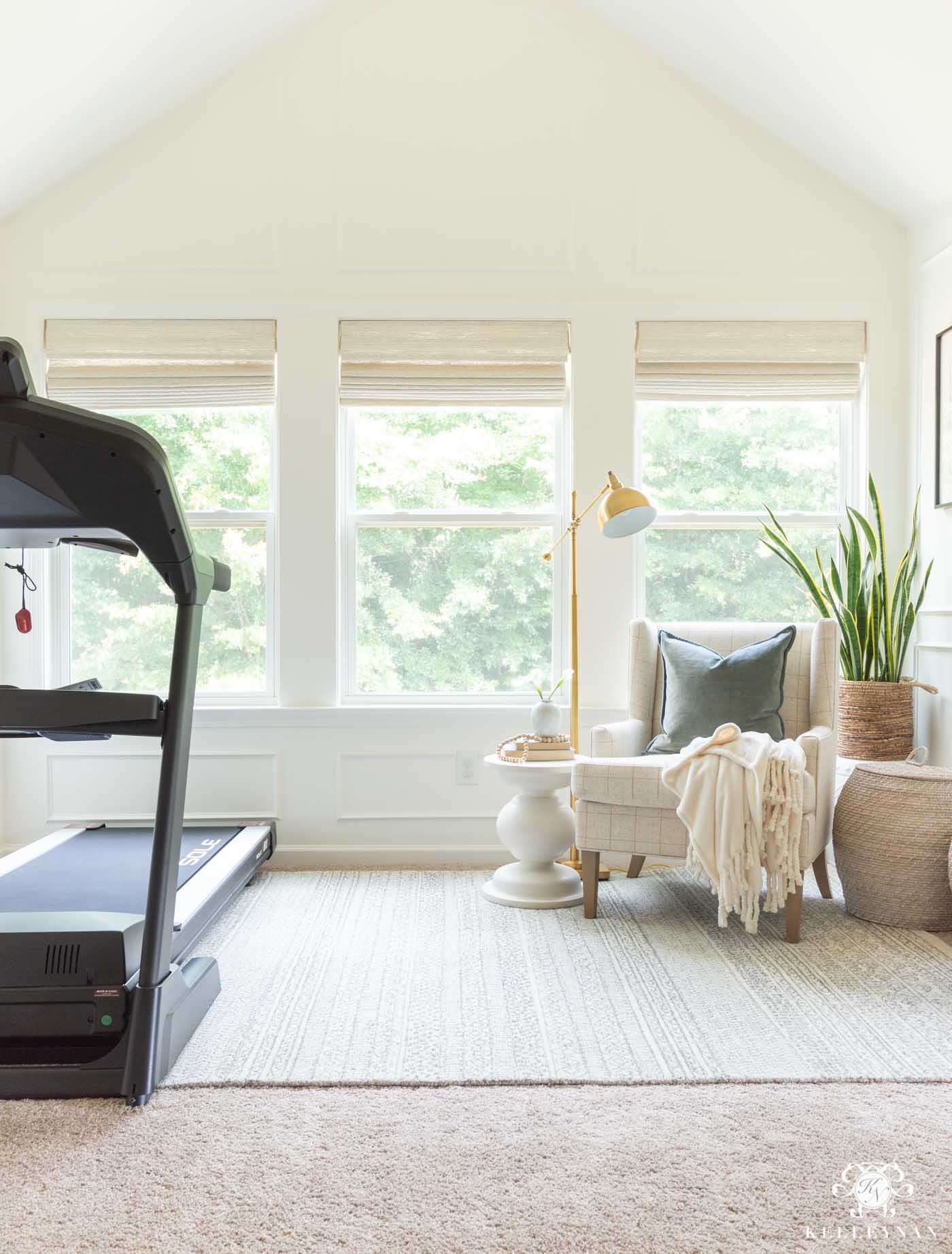 Decorating a Master Bedroom SItting Area with Treadmill Workout Equipment