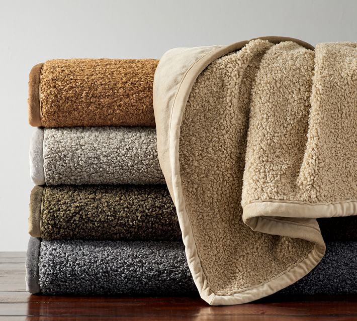 https://kelleynan.com/wp-content/uploads/2020/09/cozy-teddy-faux-fur-throws-o.jpg