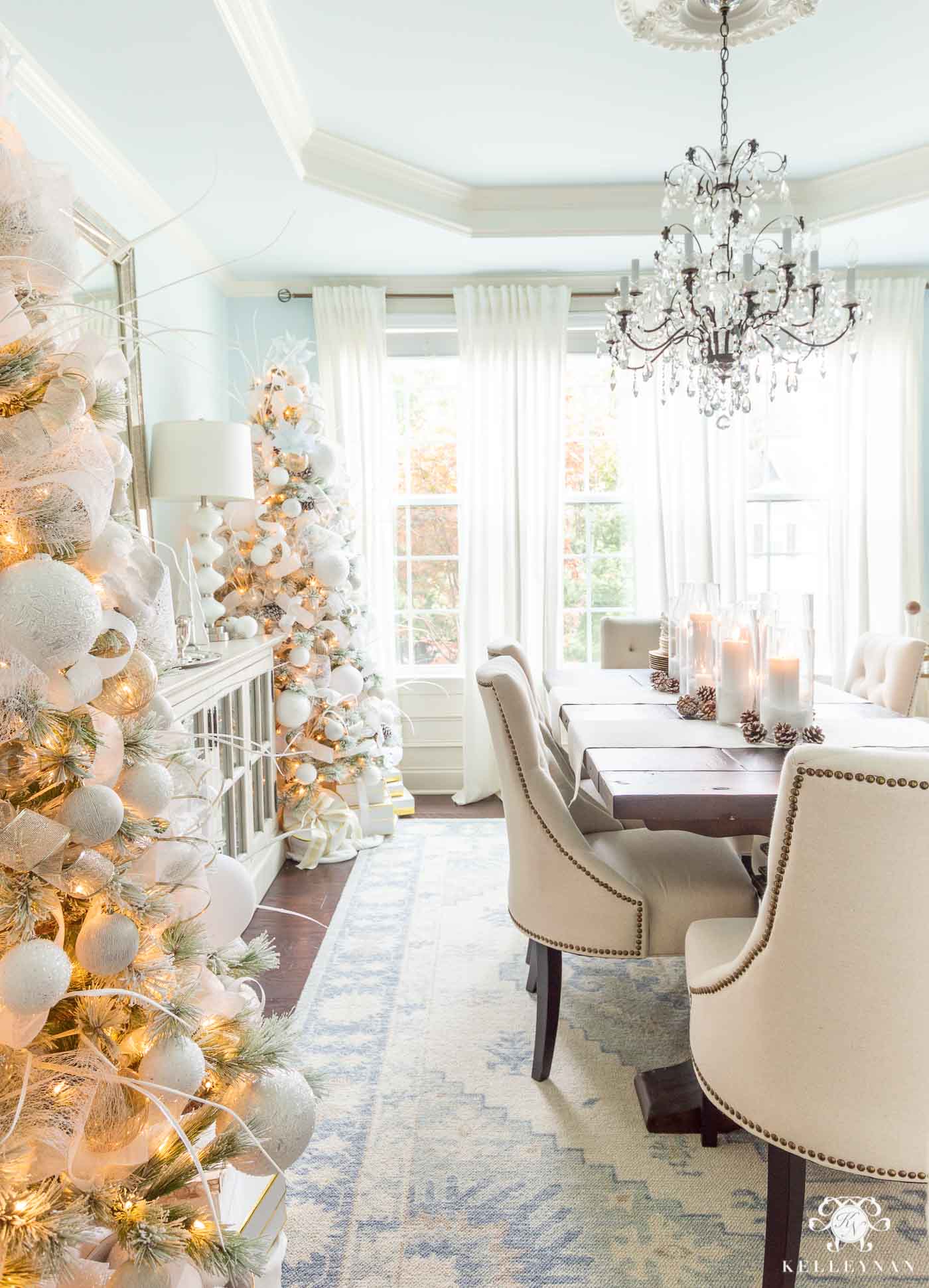 Dining Room Christmas Decor -- Matching Christmas Trees in a Pale Blue Room