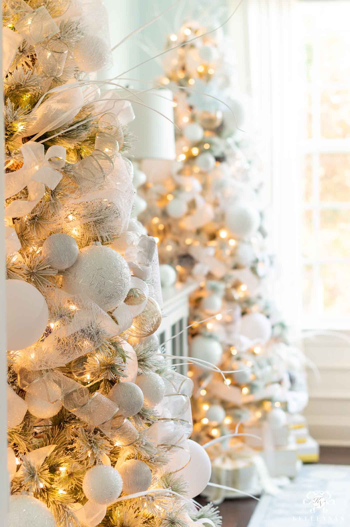 Pair of Matching Christmas Trees in the Dining Room -- Snowy and Flocked!