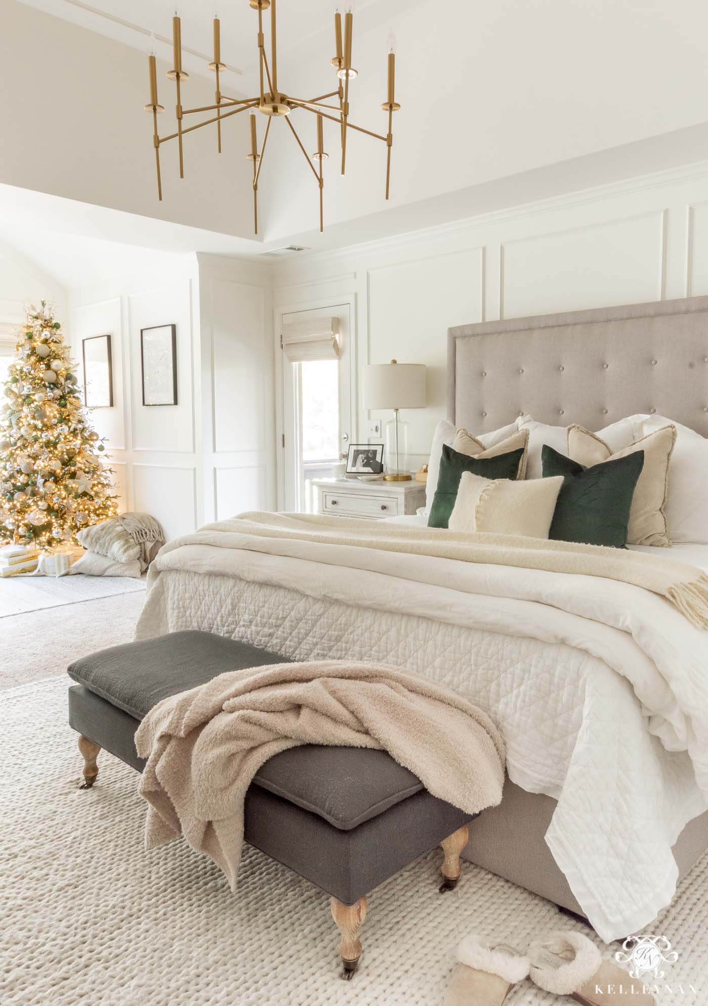 Green and white christmas decor in the master bedroom