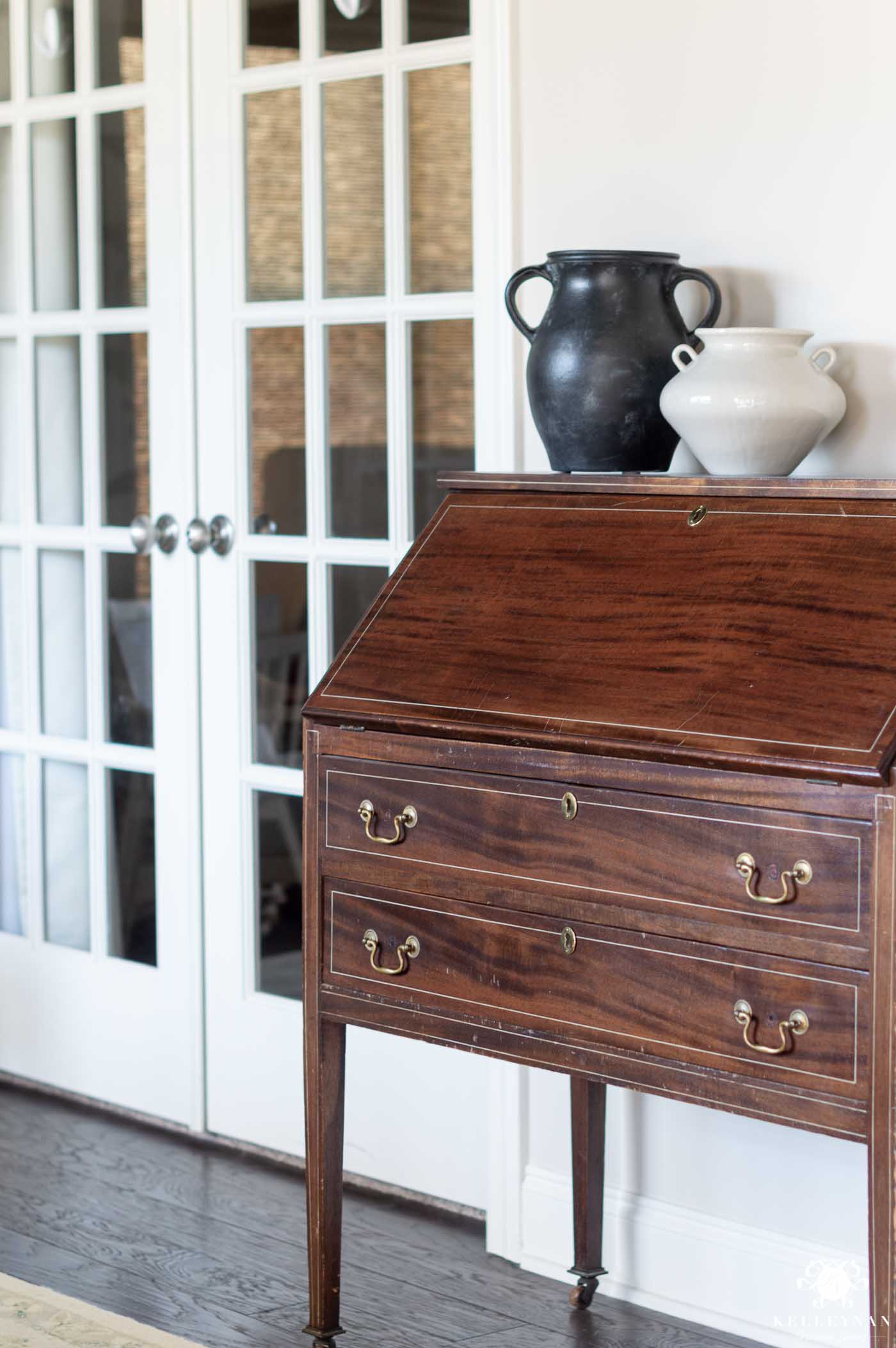 antique secretary desk in an otherwise transitional conversation room