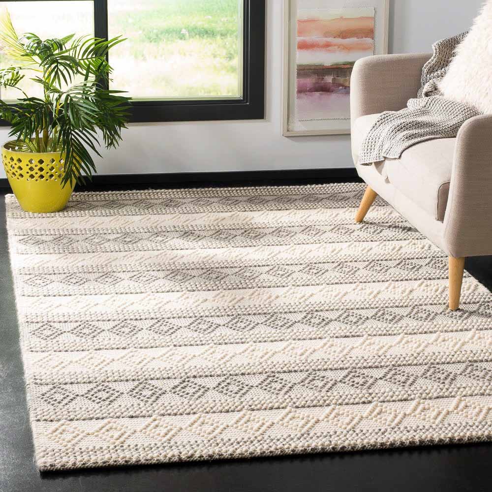 https://kelleynan.com/wp-content/uploads/2021/03/playroom-neutral-rug.jpg