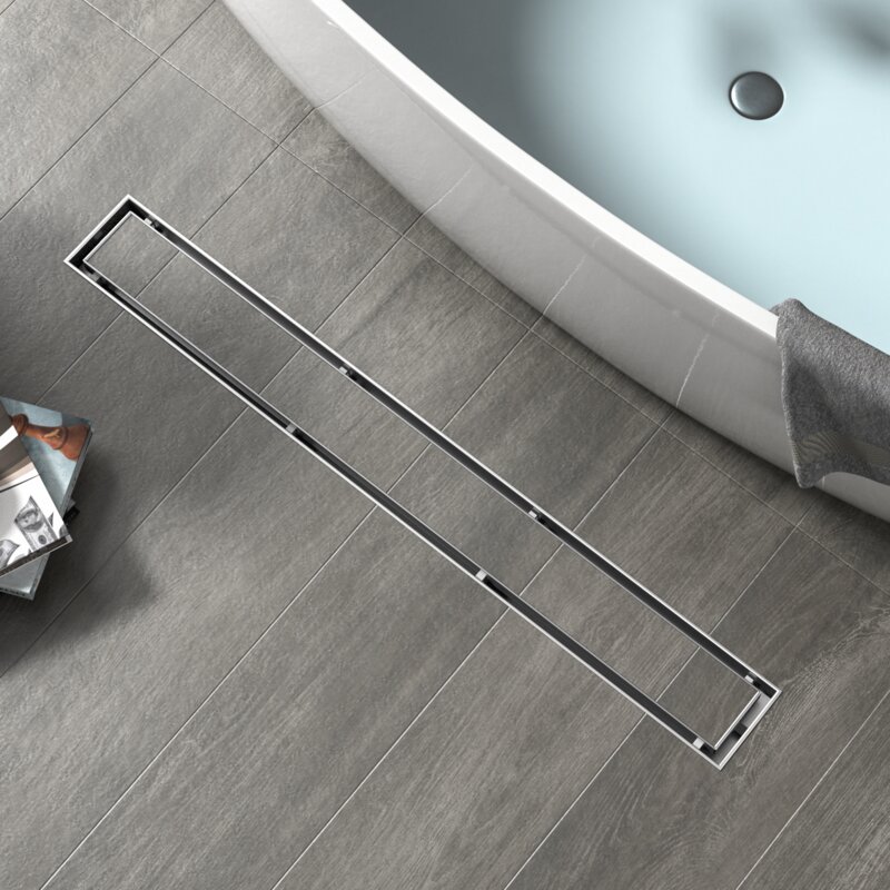 https://kelleynan.com/wp-content/uploads/2021/05/Tile-InShowerDrain.jpeg