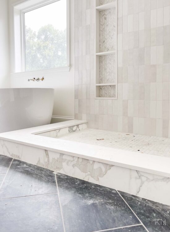 marble shower curb and the master bathroom reno progress