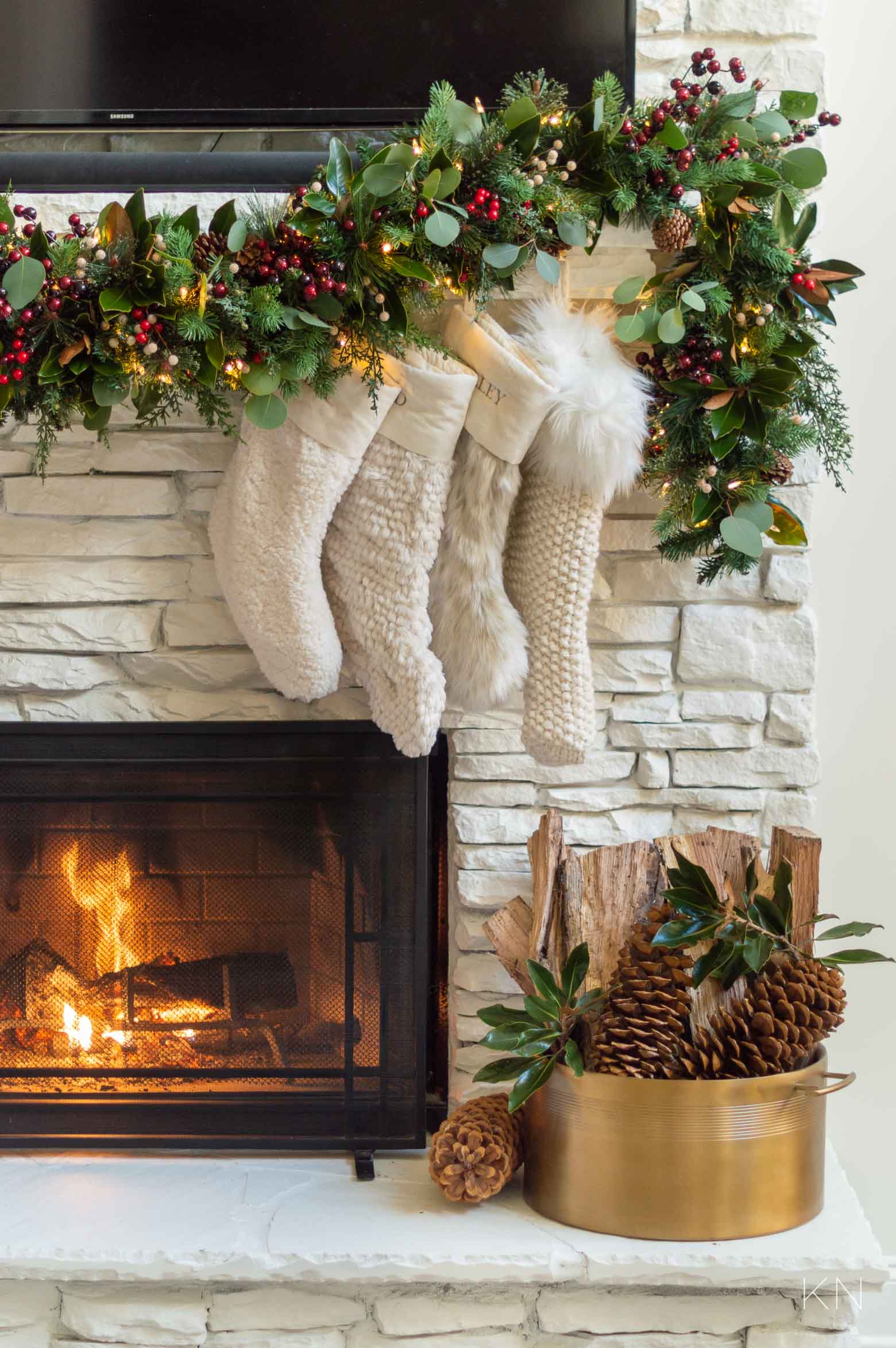 Mix and Match Fur Stockings on Christmas Fireplace with Garland 