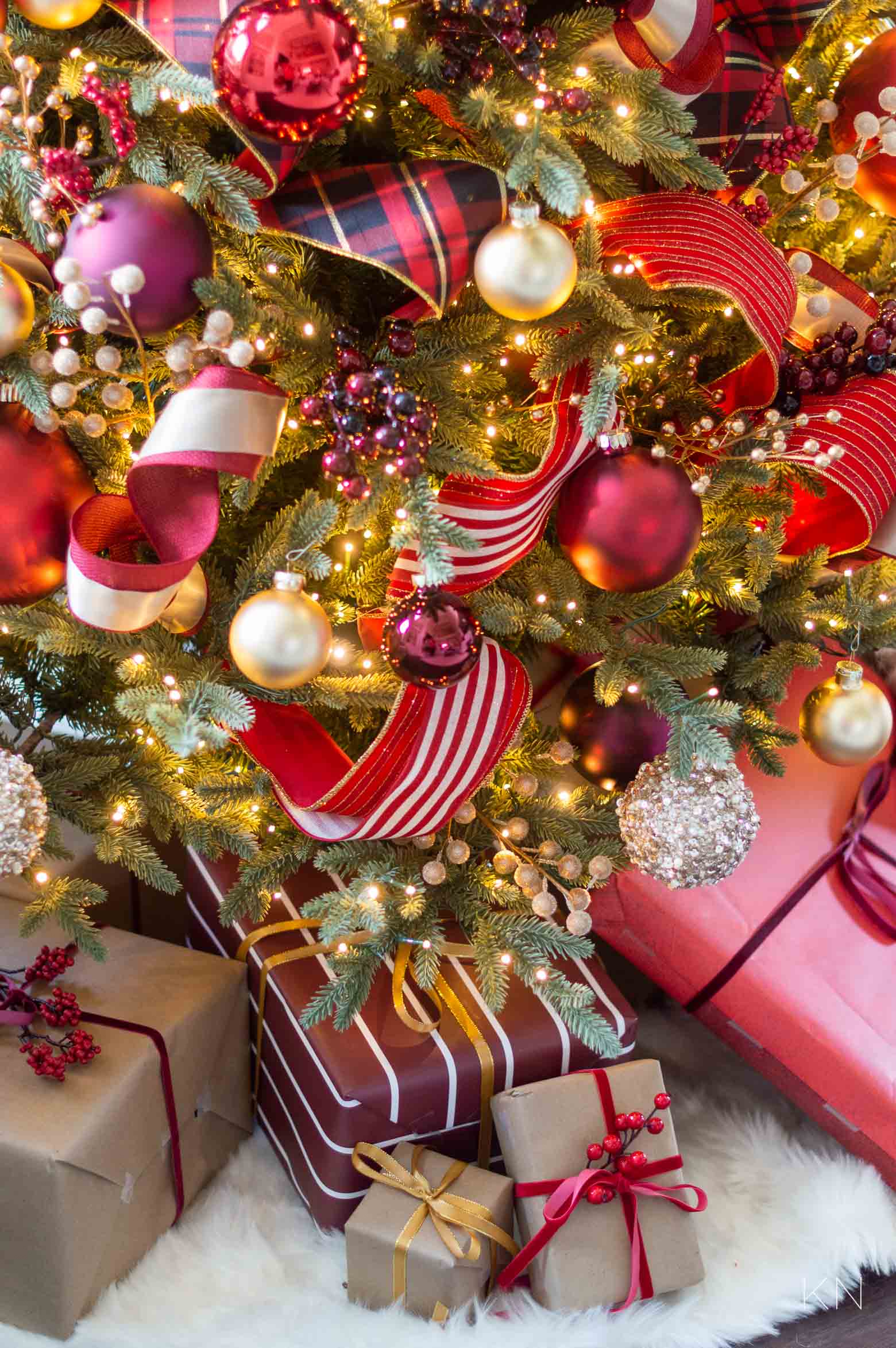 Red and gold Christmas Packages Under Red and gold Christmas tree