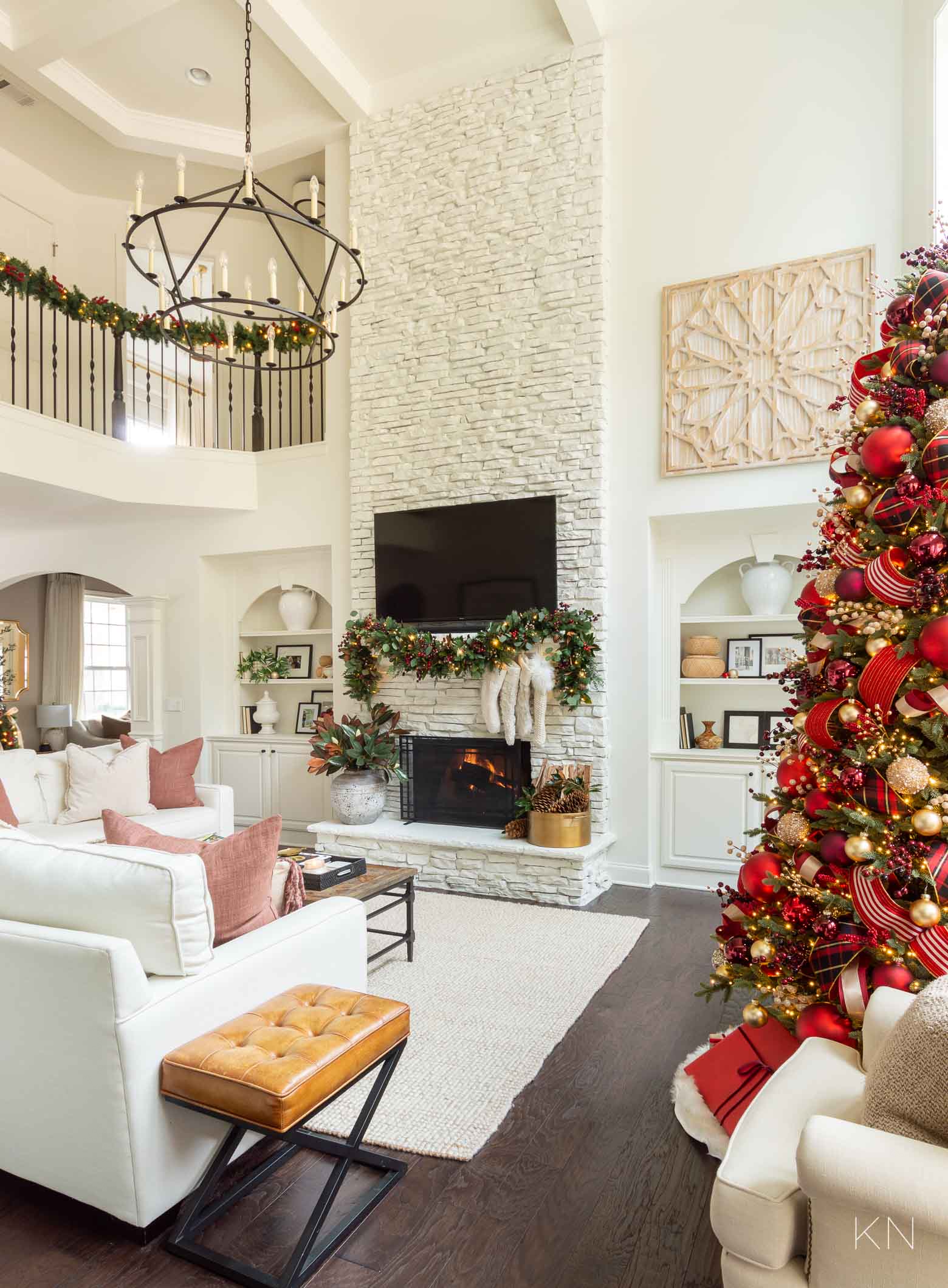 White Christmas Living Room with Red and Gold Christmas Tree and Holiday Decor