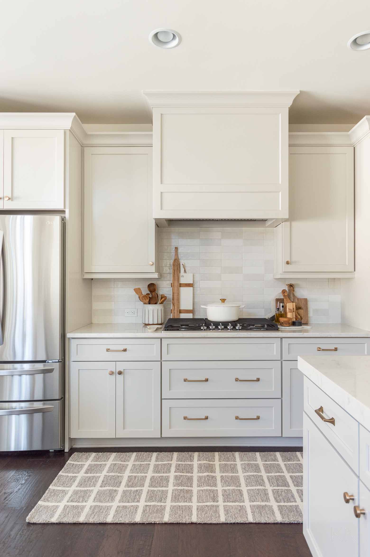 Warm Light Gray Kitchen Cabinet Makeover with Agreeable Gray Sherwin Williams Paint and Shaker Cabinet Fronts