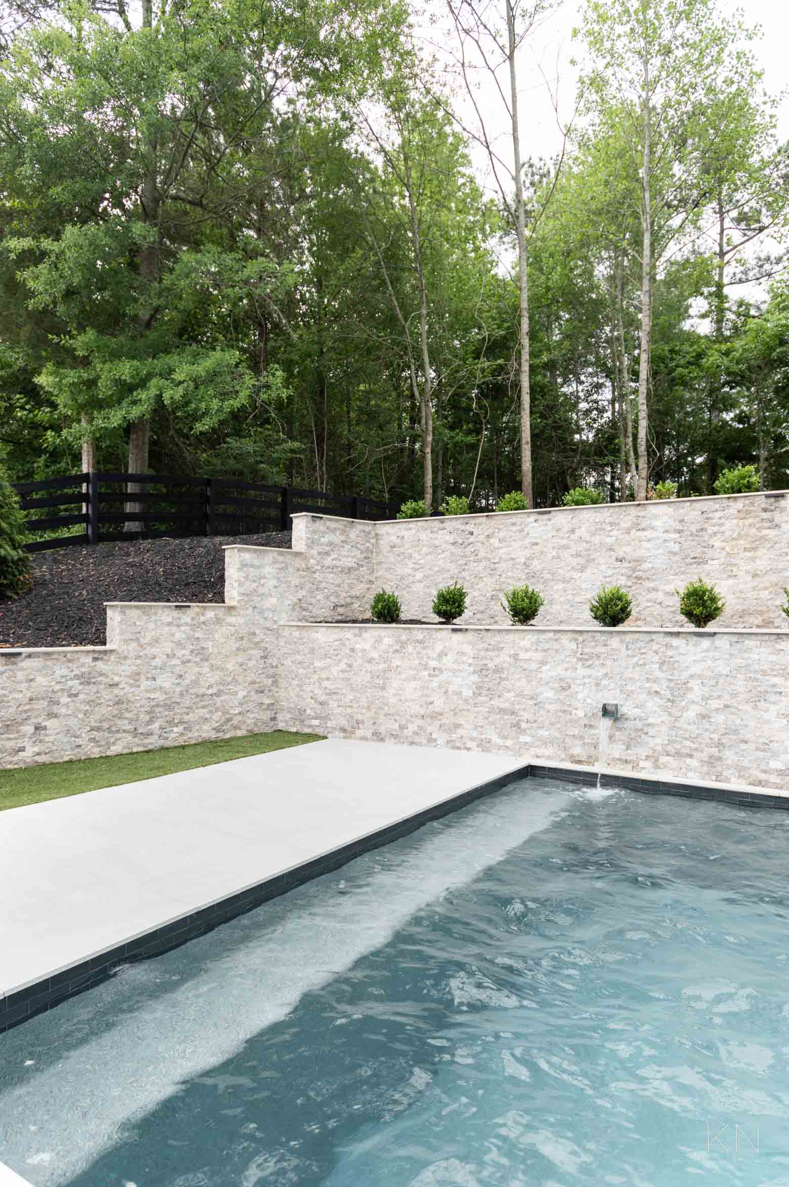 French Gray Pebble Concrete Pool Design