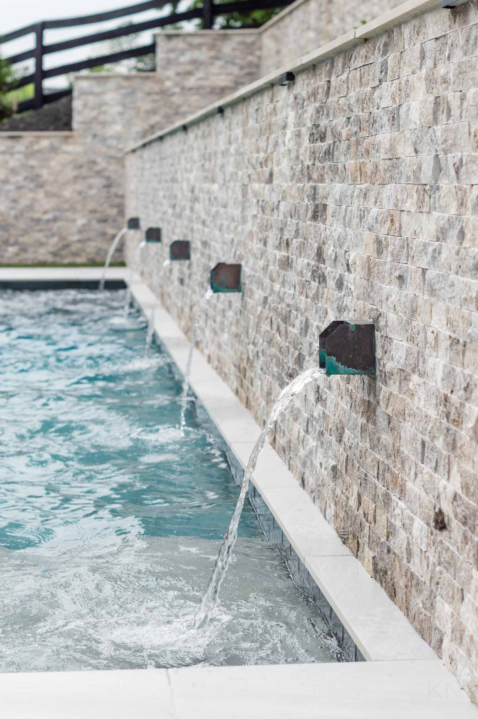 Scupper Waterfalls on Pool Retaining Wall Design