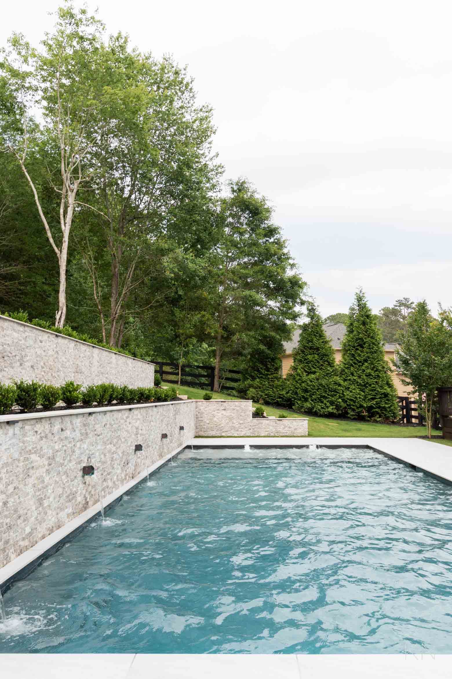 Two Retaining Wall Pool Design with Scuppers / Waterfalls