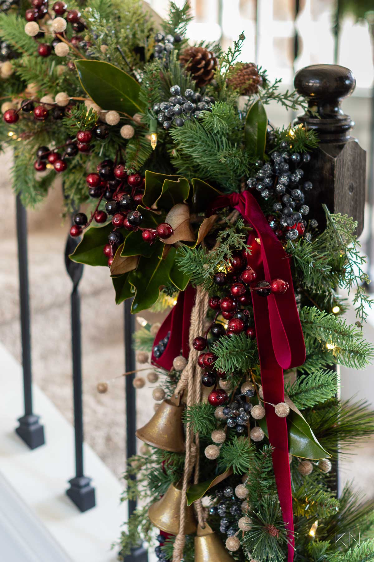 https://kelleynan.com/wp-content/uploads/2023/11/embellished-stair-christmas-garland.jpg