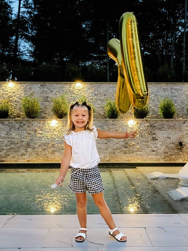 First day of school tradition with gold balloon