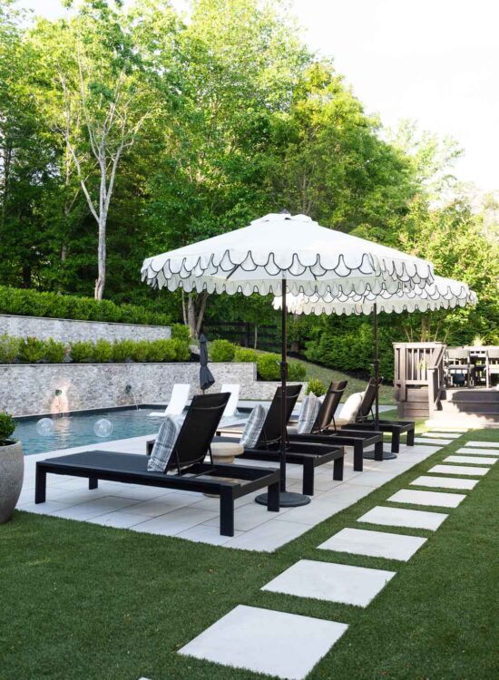 Pool Lounger Setup with Scalloped Umbrellas