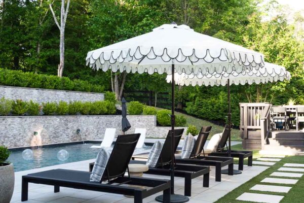 Pool Lounger Setup with Scalloped Umbrellas