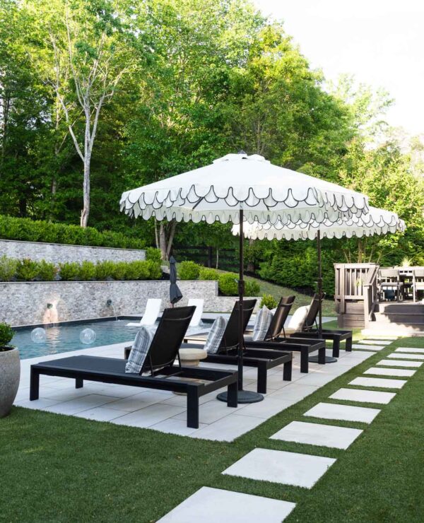 Pool Lounger Setup with Scalloped Umbrellas